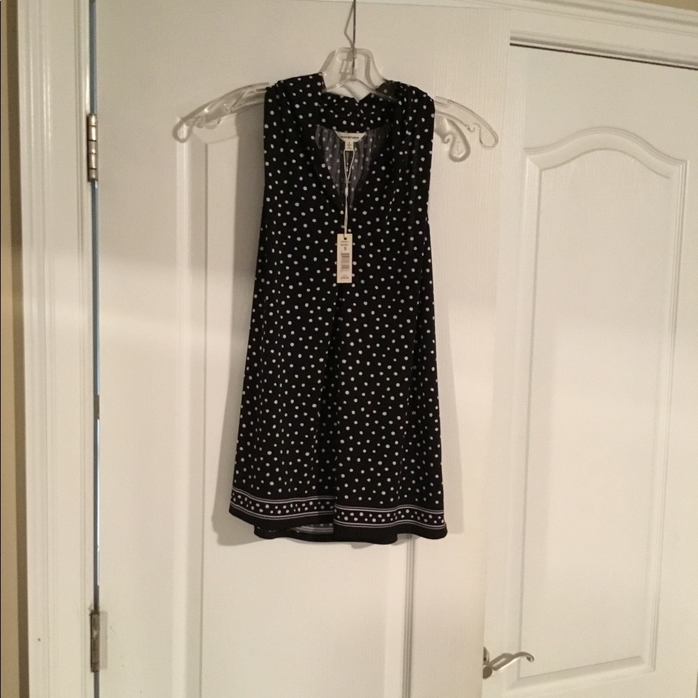Black and white sleeveless polkadot blouse